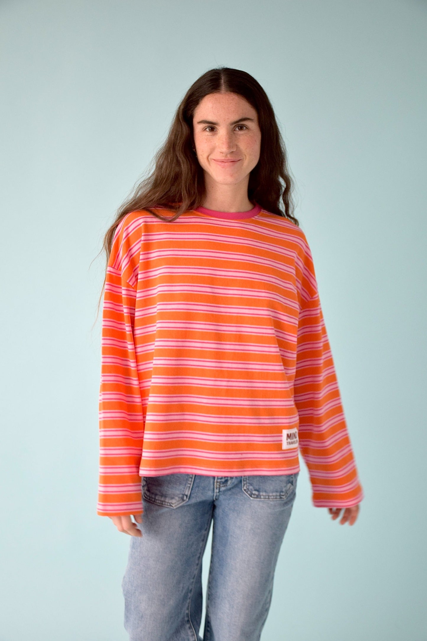 Camiseta Pipa Naranja y Fucsia