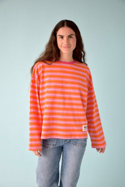 Camiseta Pipa Naranja y Fucsia