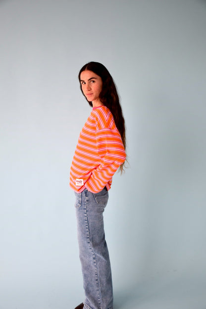 Camiseta Pipa Naranja y Fucsia