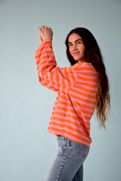 Camiseta Pipa Naranja y Fucsia